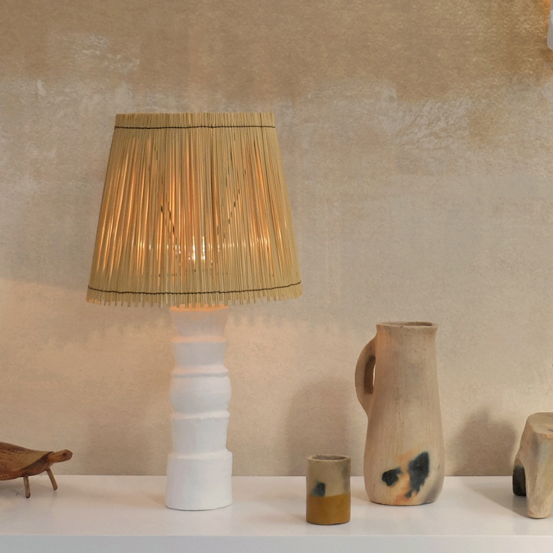 Tribal ceramic lamp with sea rush shade